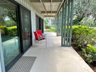 133 Palm View Ct Unit 3513/4, Haines City, FL 33844 - view of patio / terrace with a porch