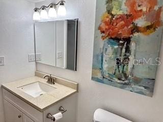 133 Palm View Ct Unit 3513/4, Haines City, FL 33844 - bathroom with toilet and vanity