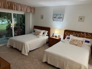 133 Palm View Ct Unit 3513/4, Haines City, FL 33844 - bedroom featuring carpet flooring