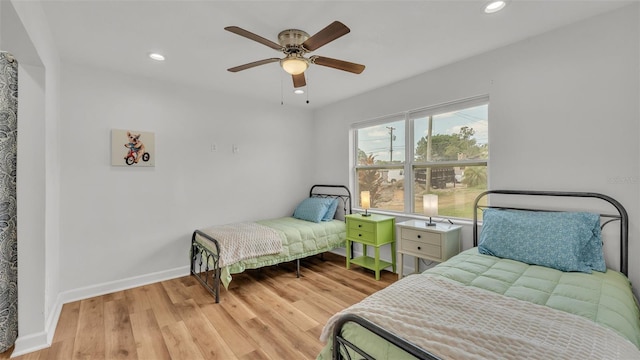 900 Lake Jessie Dr, Winter Haven, FL 33881 - bedroom featuring recessed lighting, light wood-style floors, baseboards, and a ceiling fan