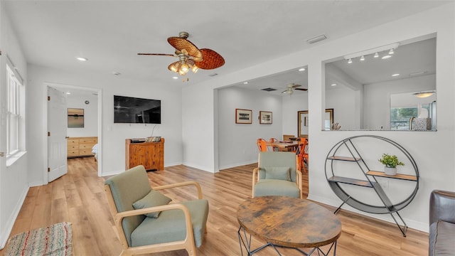 900 Lake Jessie Dr, Winter Haven, FL 33881 - living area featuring ceiling fan, light wood finished floors, baseboards, and recessed lighting