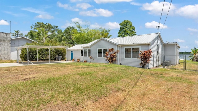 900 Lake Jessie Dr, Winter Haven, FL 33881 - view of front of home featuring metal roof and concrete driveway