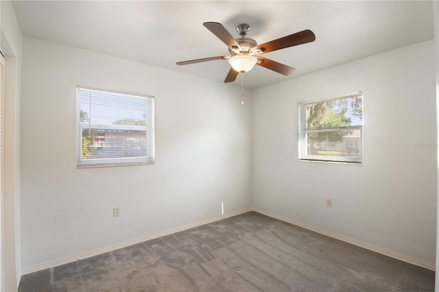 1163 Lake Dr, Lake Wales, FL 33859 - carpeted spare room with plenty of natural light, a ceiling fan, and baseboards
