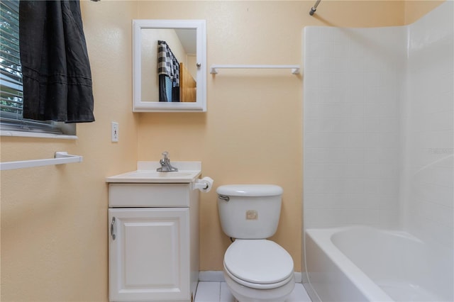 1163 Lake Dr, Lake Wales, FL 33859 - bathroom featuring toilet, vanity, tile patterned flooring, and shower / bath combination
