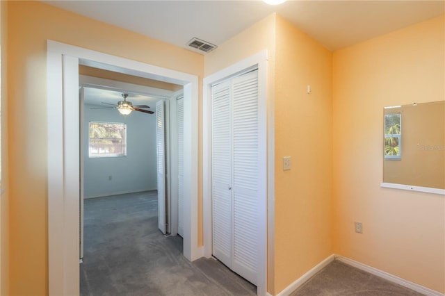 1163 Lake Dr, Lake Wales, FL 33859 - hall with carpet floors and baseboards