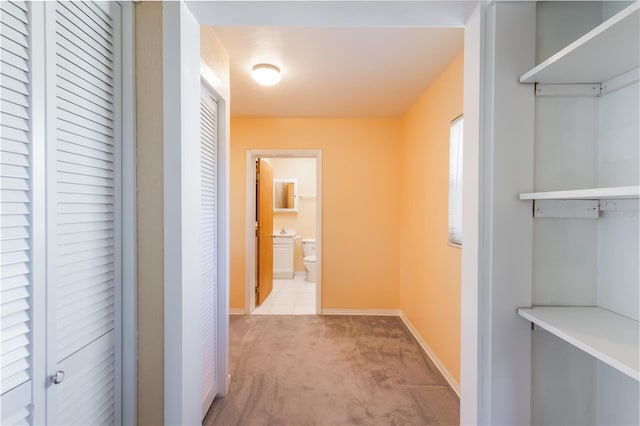 1163 Lake Dr, Lake Wales, FL 33859 - hall with light colored carpet and baseboards
