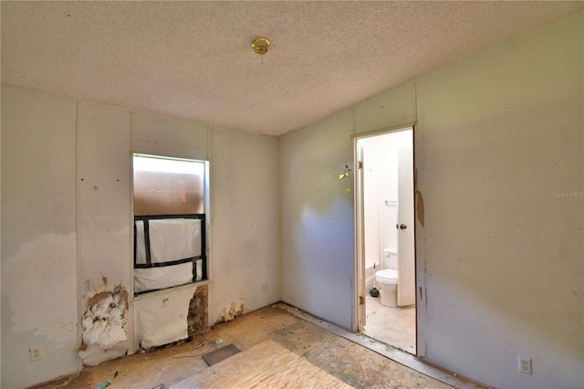 1294 1/2 38th St NW, Winter Haven, FL 33881 - empty room featuring a textured ceiling