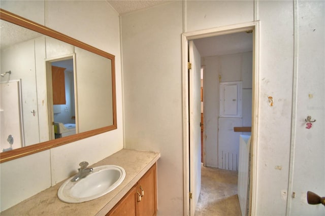 1294 1/2 38th St NW, Winter Haven, FL 33881 - bathroom with a textured ceiling and vanity