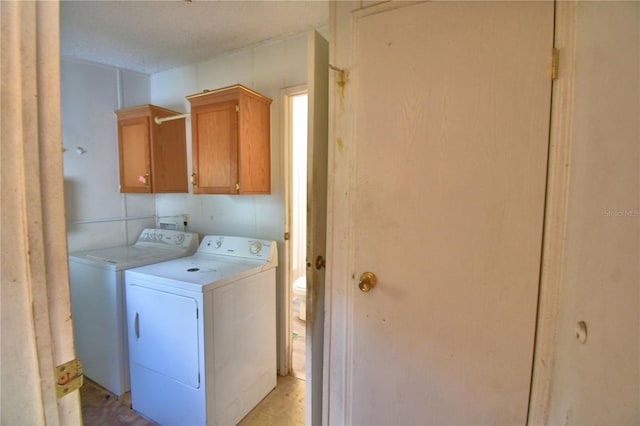 1294 1/2 38th St NW, Winter Haven, FL 33881 - clothes washing area featuring independent washer and dryer and cabinet space