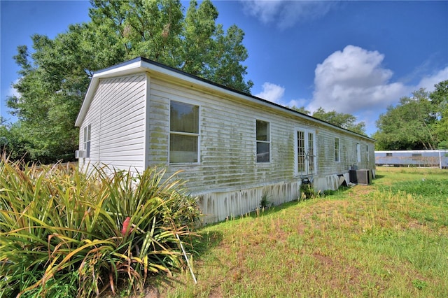 1294 1/2 38th St NW, Winter Haven, FL 33881 - view of side of property featuring cooling unit