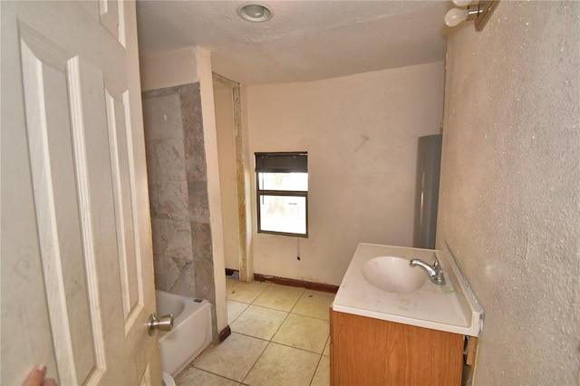 1294 1/2 38th St NW, Winter Haven, FL 33881 - bathroom featuring tile patterned flooring and vanity