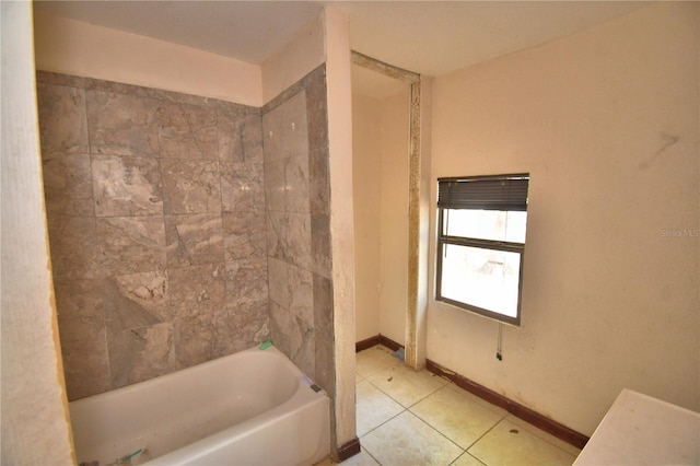1294 1/2 38th St NW, Winter Haven, FL 33881 - full bathroom with tile patterned flooring, shower / washtub combination, and baseboards