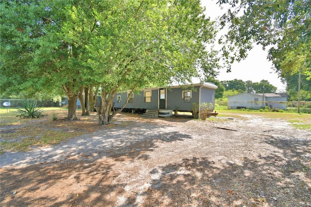 1294 1/2 38th St NW, Winter Haven, FL 33881 - manufactured / mobile home featuring fence