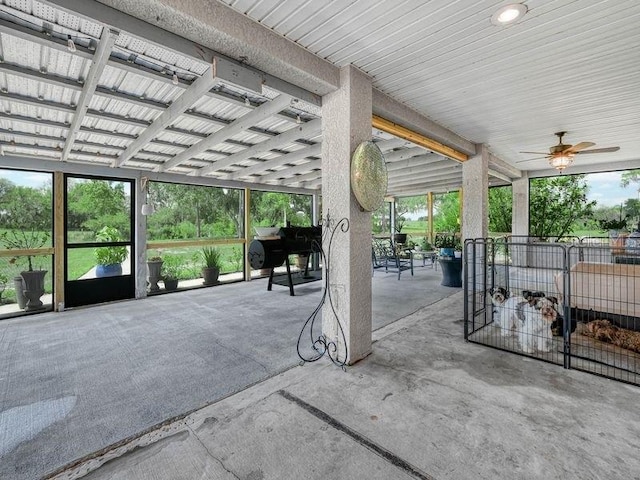 view of patio featuring a ceiling fan