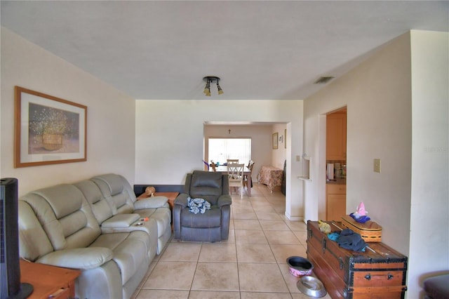 780 Oleander Dr SE, Winter Haven, FL 33880 - living room featuring light tile patterned floors