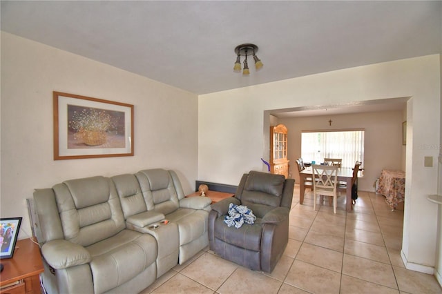 780 Oleander Dr SE, Winter Haven, FL 33880 - living area with light tile patterned floors