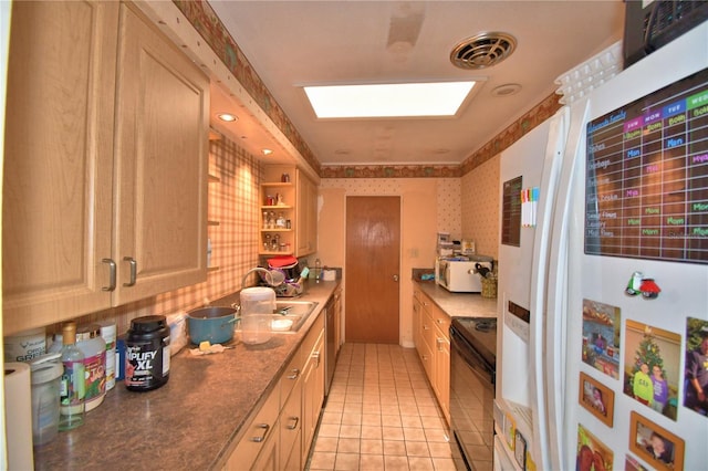 780 Oleander Dr SE, Winter Haven, FL 33880 - kitchen featuring black range with electric stovetop, white fridge with ice dispenser, a skylight, a sink, and light tile patterned floors