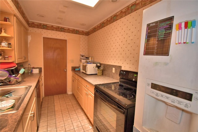 780 Oleander Dr SE, Winter Haven, FL 33880 - kitchen with electric range, white microwave, a sink, wallpapered walls, and light tile patterned floors