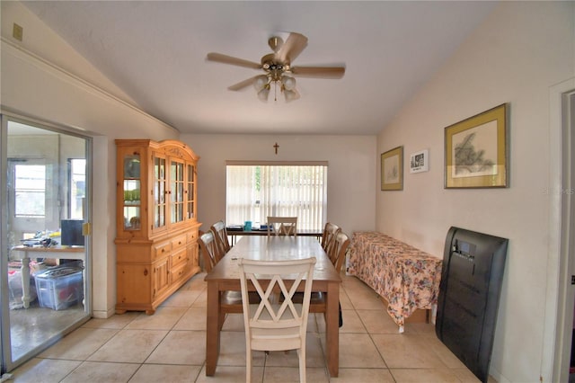 780 Oleander Dr SE, Winter Haven, FL 33880 - dining area featuring a ceiling fan, light tile patterned flooring, and lofted ceiling