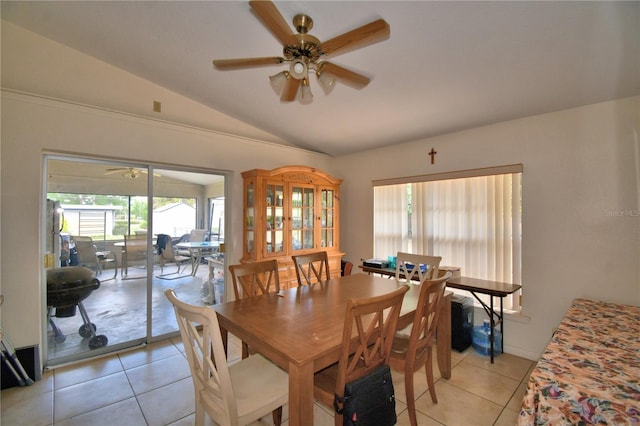 780 Oleander Dr SE, Winter Haven, FL 33880 - dining area with lofted ceiling, ceiling fan, and light tile patterned floors