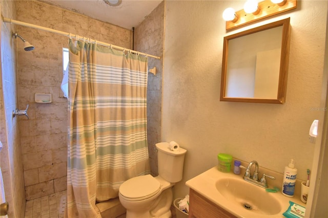 780 Oleander Dr SE, Winter Haven, FL 33880 - full bathroom featuring a tile shower, toilet, and vanity