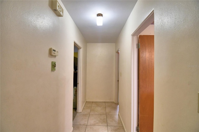 780 Oleander Dr SE, Winter Haven, FL 33880 - hall featuring light tile patterned flooring