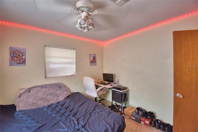 780 Oleander Dr SE, Winter Haven, FL 33880 - bedroom with carpet floors and a ceiling fan