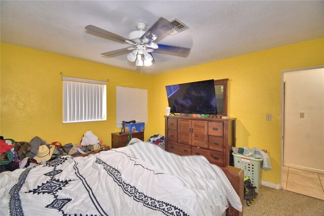 780 Oleander Dr SE, Winter Haven, FL 33880 - carpeted bedroom featuring a ceiling fan