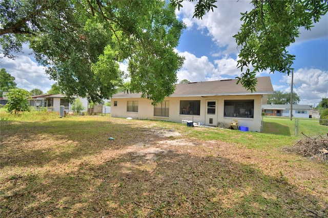 780 Oleander Dr SE, Winter Haven, FL 33880 - rear view of house featuring stucco siding