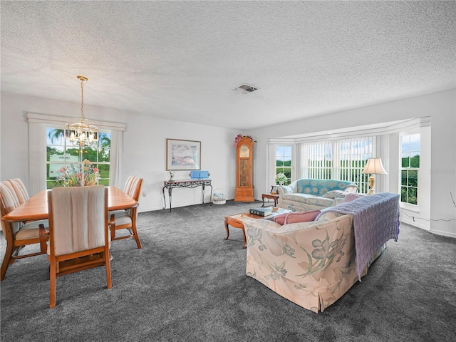 409 N 6th St, Lake Hamilton, FL 33851 - living area featuring a chandelier, carpet flooring, a textured ceiling, and baseboards