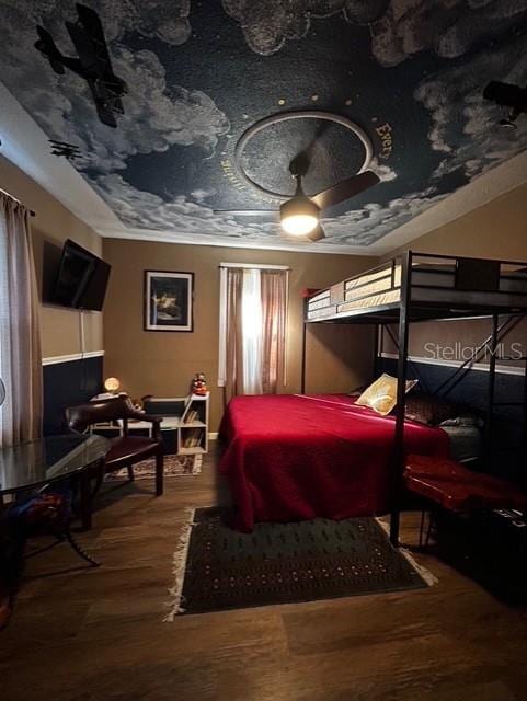 bedroom featuring wood finished floors