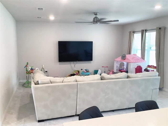 1050 Michelangelo Ln, Winter Haven, FL 33884 - living room with ceiling fan, baseboards, and recessed lighting