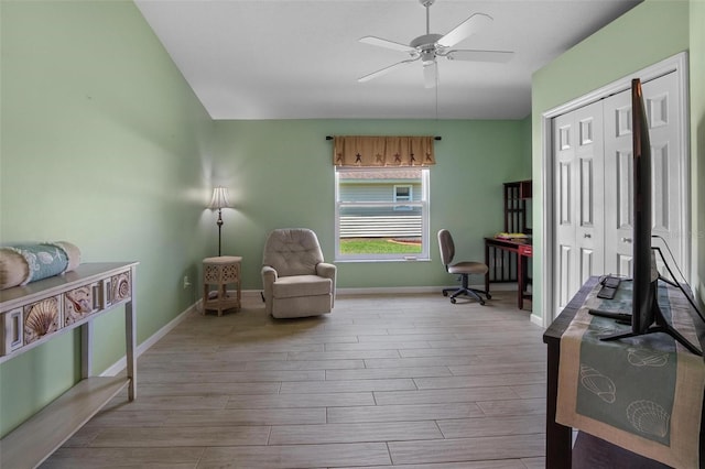 4005 Carter Creek Dr, Avon Park, FL 33825 - living area with wood finished floors, baseboards, a ceiling fan, and vaulted ceiling