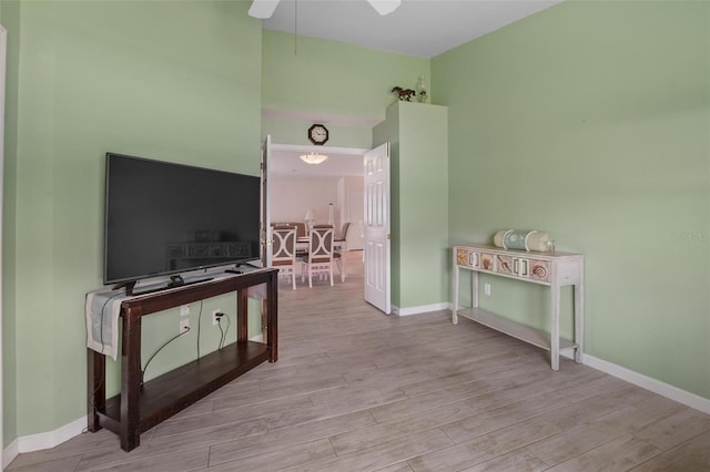 4005 Carter Creek Dr, Avon Park, FL 33825 - hallway featuring wood finished floors and baseboards