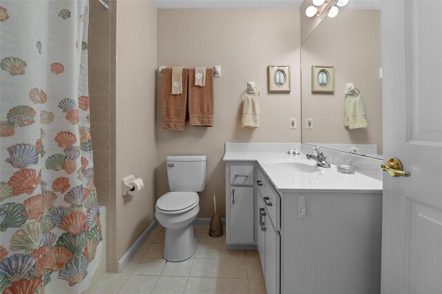 4005 Carter Creek Dr, Avon Park, FL 33825 - bathroom with toilet, tile patterned floors, vanity, and curtained shower