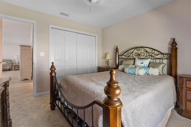 4005 Carter Creek Dr, Avon Park, FL 33825 - bedroom with a closet, light carpet, and baseboards