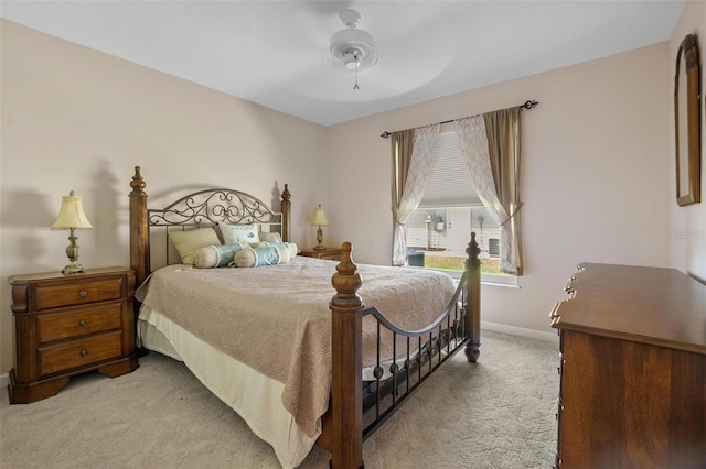 4005 Carter Creek Dr, Avon Park, FL 33825 - bedroom with light carpet, baseboards, and a ceiling fan