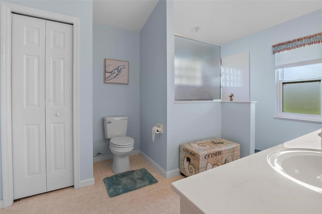 4005 Carter Creek Dr, Avon Park, FL 33825 - bathroom with a closet, tile patterned flooring, a sink, and toilet