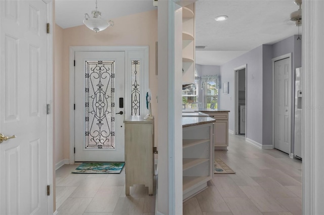 4005 Carter Creek Dr, Avon Park, FL 33825 - entryway with baseboards and recessed lighting