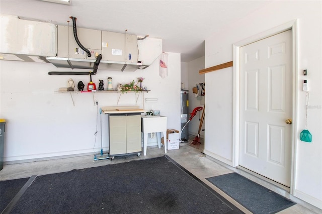 4005 Carter Creek Dr, Avon Park, FL 33825 - garage featuring water heater and a sink