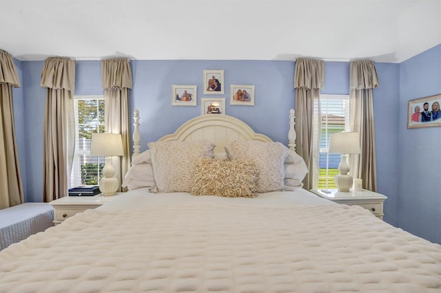 109 Lake Mariam Way, Winter Haven, FL 33884 - bedroom featuring multiple windows