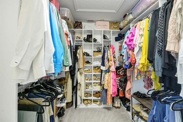 109 Lake Mariam Way, Winter Haven, FL 33884 - walk in closet featuring attic access and tile patterned flooring