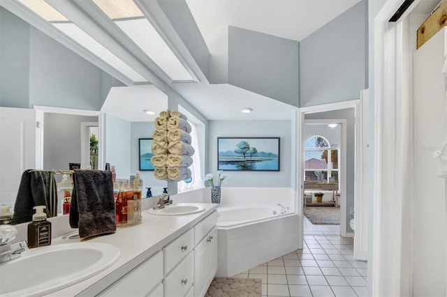 109 Lake Mariam Way, Winter Haven, FL 33884 - bathroom with a bath, tile patterned floors, toilet, and double vanity