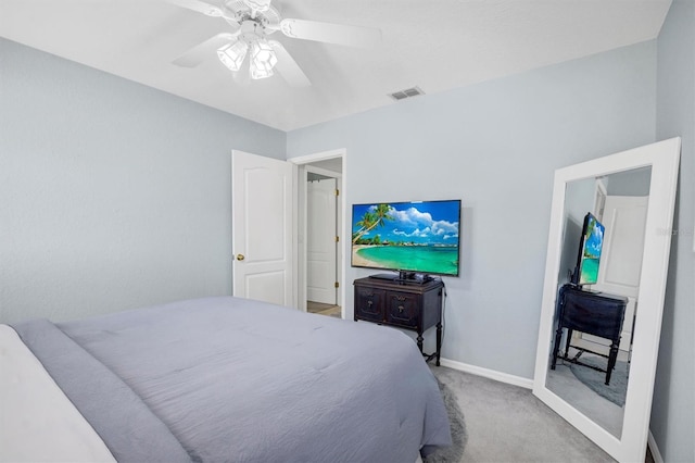 109 Lake Mariam Way, Winter Haven, FL 33884 - bedroom featuring light colored carpet, ceiling fan, and baseboards