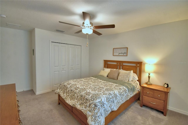 4400 Trotters Way, Lakeland, FL 33801 - bedroom featuring light carpet, a closet, baseboards, and ceiling fan
