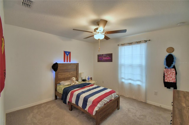 4400 Trotters Way, Lakeland, FL 33801 - bedroom featuring light colored carpet, ceiling fan, and baseboards