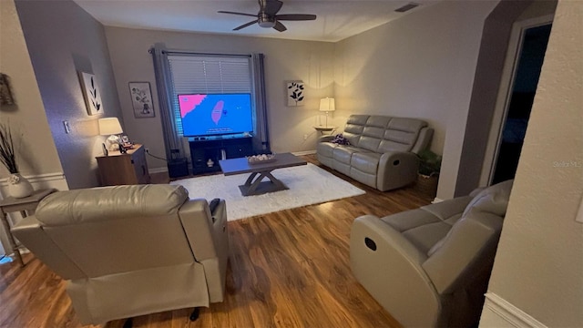 3828 Eloise Estates Ct, Winter Haven, FL 33881 - living room with ceiling fan, wood finished floors, and baseboards