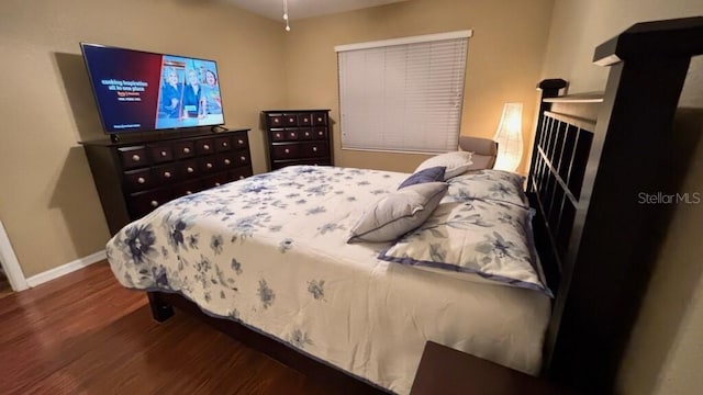 3828 Eloise Estates Ct, Winter Haven, FL 33881 - bedroom featuring wood finished floors and baseboards