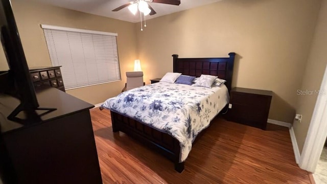 3828 Eloise Estates Ct, Winter Haven, FL 33881 - bedroom featuring wood finished floors, baseboards, and ceiling fan