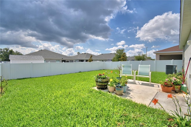 879 Orleans Dr, Eagle Lake, FL 33839 - view of yard with a patio area and central air condition unit